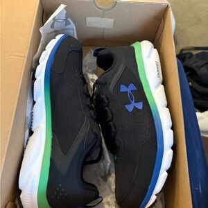 Under Armour Black and White Charged Assert 9.5 Shoes